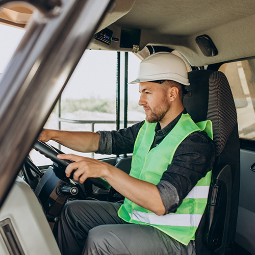 Conducteur de poids lourd.